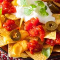 Lulu’S Nachos · $4 classic nacho, corn nacho chips w/ melted cheese -, $5 corn nacho chips w/cheese and chil...