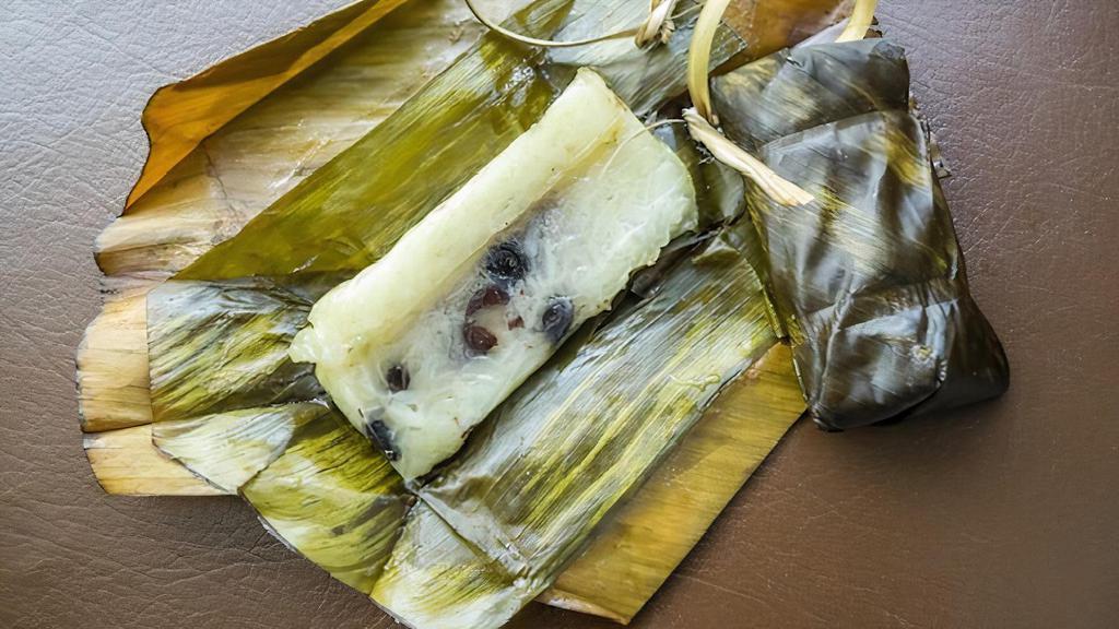 Steam Taro Sticky Rice (2) · Steam Coconut sticky rice in Banana leaves with Taro & Black Bean filling.
