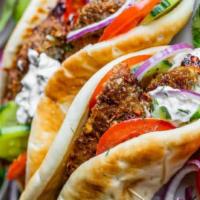 Lamb Gyro · Served with salad. Ingredients:- gyro lamb gyro marinated with natural herbs and spices, let...