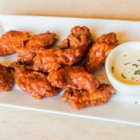 Wings · Served with your choice of signature sauce.