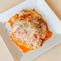 Chicken Parmigiana · Comes with marinara sauce and mozzarella cheese.