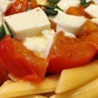Penne Caprese · Plum tomato, fresh basil and fresh mozzarella sauteed in a light garlic and oil brodino with...