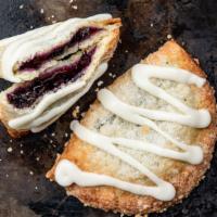 Blueberry Lemon Pie · Sweet blueberries mixed with a touch of lemon zest and finished off with tart lemon frosting.