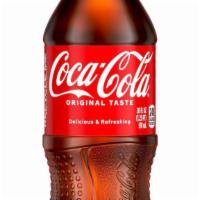 Bottled Coke · Quench your thirst with a refreshing 20 oz. bottled beverage.