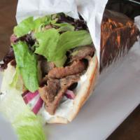 Gyro · Served in a warm pita with lettuce, tomatoes, red onions, and tzatziki sauce.