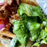 Marinated Chicken Gyro · Served in a warm pita with lettuce, tomatoes, red onions, and tzatziki sauce.