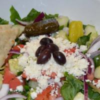 Greek Salad · Romaine, spring mix, tomatoes, red onion, cucumber, feta, olives, grape leaf, pepperoncini, ...