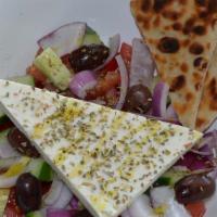 Horiatiki Salad · Tomatoes, cucumbers, red pepper, red onion, olives, slab feta, extra virgin olive oil, and a...