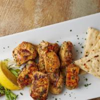 Chicken Sticks · Kebobs of meat, marinated and grilled. Served with pita.