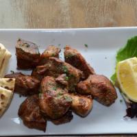 Pork Sticks · Kebobs of meat, marinated and grilled. Served with pita.