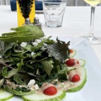 Salad · Fresh veggies and house-made dressing.