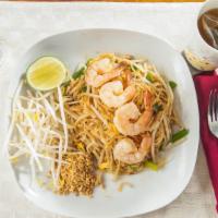 Pad Thai · Traditional Thai noodles with egg, bean sprouts, bean curd and ground peanuts.