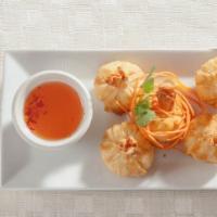 Crab Rangoon · Crispy wonton filled with cream cheese, imitation crab and Thai seasonings.