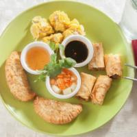 A11 .Combo Appetizer · Curry puff, shumai, spring roll.