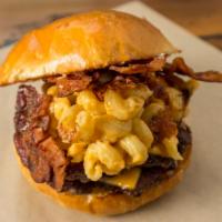 King Troy Burger · Double stacked, bacon, American, mac and cheese, bib sauce on toasted brioche.