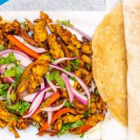 Tawa Chicken With Paratha · Grilled chicken, sautéed onions, house blend spices, cilantro