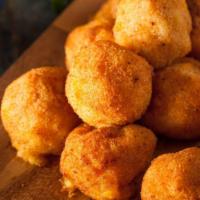 Fried Mac And Cheese Balls (4 Pcs) · Mac and cheese balls fried. Served with honey mustard.