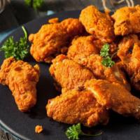 King Buffalo Wings · Served with blue cheese, buffalo sauce, carrots, and celery.