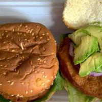 Chicken Sandwich · Grilled vegetarian chicken sandwich served on a toasted sesame bun, garnished with lettuce, ...