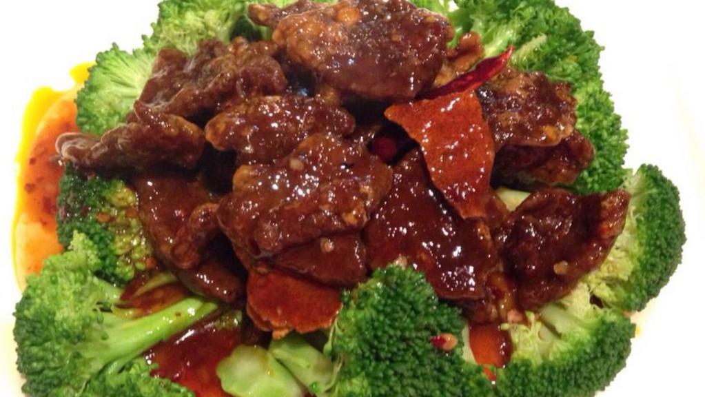 Orange Flavored Beef · Spicy. Stir fry vegetarian beef in spicy orange tangerine sauce. Served with steamed broccoli. Served with choice of rice. Hot and spicy.