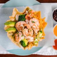 Jumbo Shrimp Salad · Fresh iceberg lettuce, tomato, cucumber, sliced avocado, cheddar cheese, and black bean.