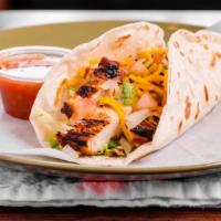 Grilled Chicken Taco · Served with fresh lettuce, tomato, cheddar cheese, and sour cream.