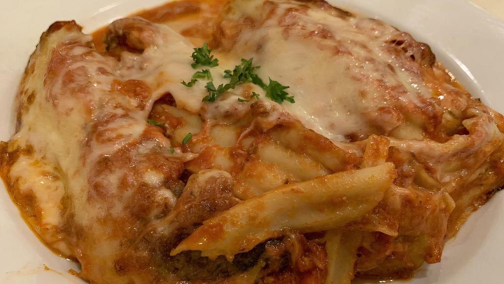Baked Lasagna · Add meatball or sausage for an additional charge.