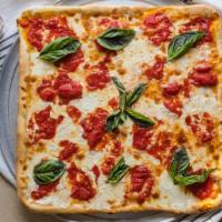 Grandma Pizza · Thin sicilian crust with plum tomatoes and Mozzarella.