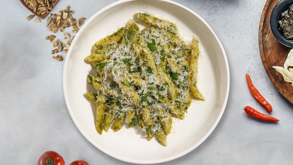 Pasta Manipesto · Fresh basil leaves, garlic, grated parmesan cooked with penne. Served with bread.