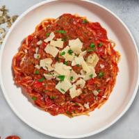 Bobbin' Bolognese · Ground beef cooked in spicy marinara sauce and served with spaghetti. Served with bread.