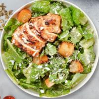 Grilled Cluck Dictator Salad · Romaine lettuce, grilled chicken, house croutons, and parmesan cheese tossed with caesar dre...