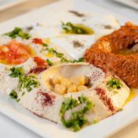 Cold Mezze Plate · Vegetarian. Hummus, baba ghanoush, labne, mouhamara.