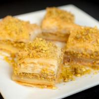 Baklawa · Buttery layers of filo dough, mixed nuts, orange blossom syrup