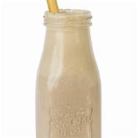 Almond Latte Smoothie · Banana, nut milk, almond, agave, and cinnamon.