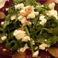 Beet Salad · Arugula, goat cheese, beets, pine nuts, basil oil, balsamic reduction