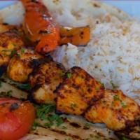 Chicken Kebab  · Served with grilled vegetables, rice and pita bread.