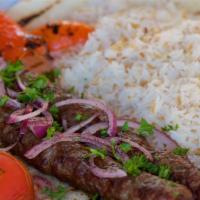 Ground Beef Kebab (Lule Kebab)  · Served with grilled vegetables, rice and pita bread.