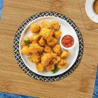Popcorn Chicken · Bite-size pieces of chicken breaded and fried until golden brown. Served with your choice of...