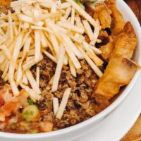 Cazuela De Frijoles · Red beans stew beans, chicharrón, rice, chips potato and avocado.