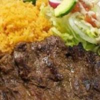Carne Asada · Marinated grilled steak served with your choice of two sides.