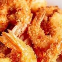 Camarones Empanizados · Crispy breaded shrimp served with your choice of two sides.