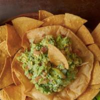 Guacamole · Avocado seasoned with cilantro, onions and fresh squeezed lime.