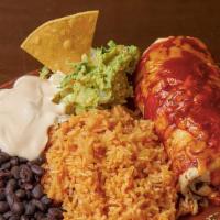 Burrito Ahogado · Flour tortilla, with rice & beans, your choice of beef or chicken, served with sour cream, g...