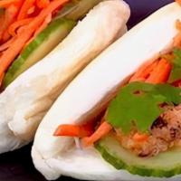 Bonmi Bao! · 2 Fluffy Bao with your choice of Protein, with Spicy Mayo, Pickled Carrots, Cucumber & Cilan...