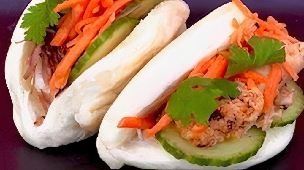 Bonmi Bao! · 2 Fluffy Bao with your choice of Protein, with Spicy Mayo, Pickled Carrots, Cucumber & Cilantro.