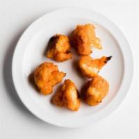Bonmi Side Crispy Buffalo Cauliflower Bites · Cauliflower battered with Aleppo pepper and buffalo-style hot sauce. Served with ranch for d...