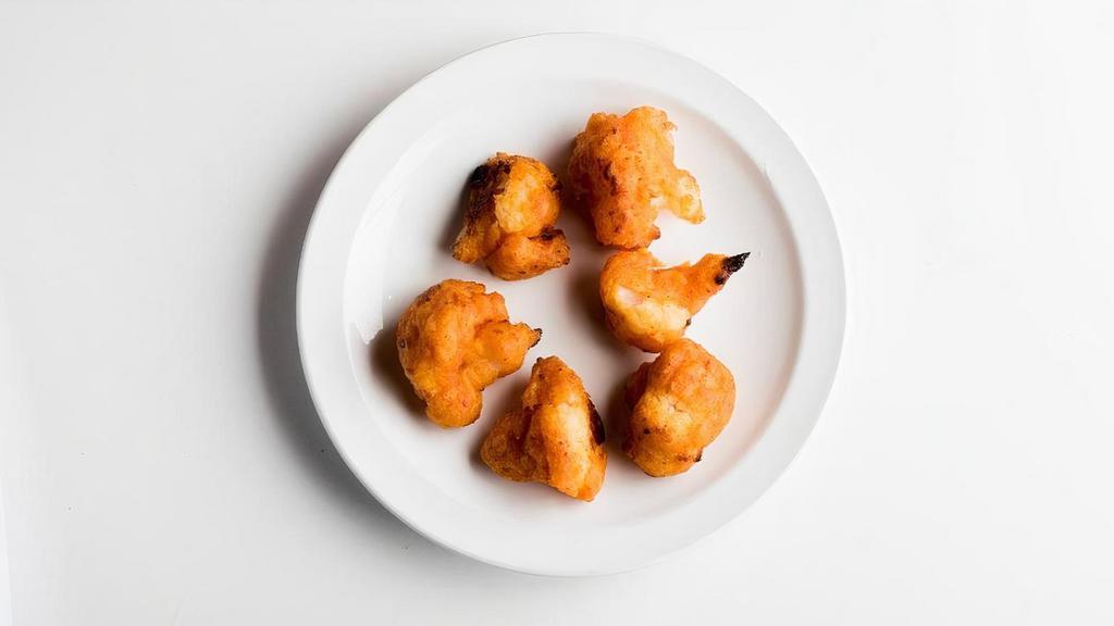 Bonmi Side Crispy Buffalo Cauliflower Bites · Cauliflower battered with Aleppo pepper and buffalo-style hot sauce. Served with ranch for dipping.