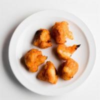P&C Side Crispy Buffalo Cauliflower Bites · Cauliflower battered with Aleppo pepper and buffalo-style hot sauce. Served with ranch for d...