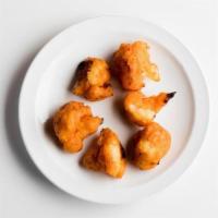 Eso Side Crispy Buffalo Cauliflower Bites · Cauliflower battered with Aleppo pepper and buffalo-style hot sauce. Served with ranch for d...
