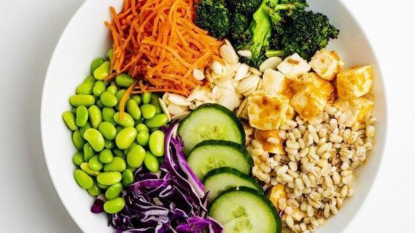 Dgb Buddha'S Bowl · Chili Garlic Tofu | Herbed Barley | Cabbage Edamame | Pickled Carrots | Roasted Broccoli | Sliced Cucumber | Sliced Almonds | Asian Sesame Dressing